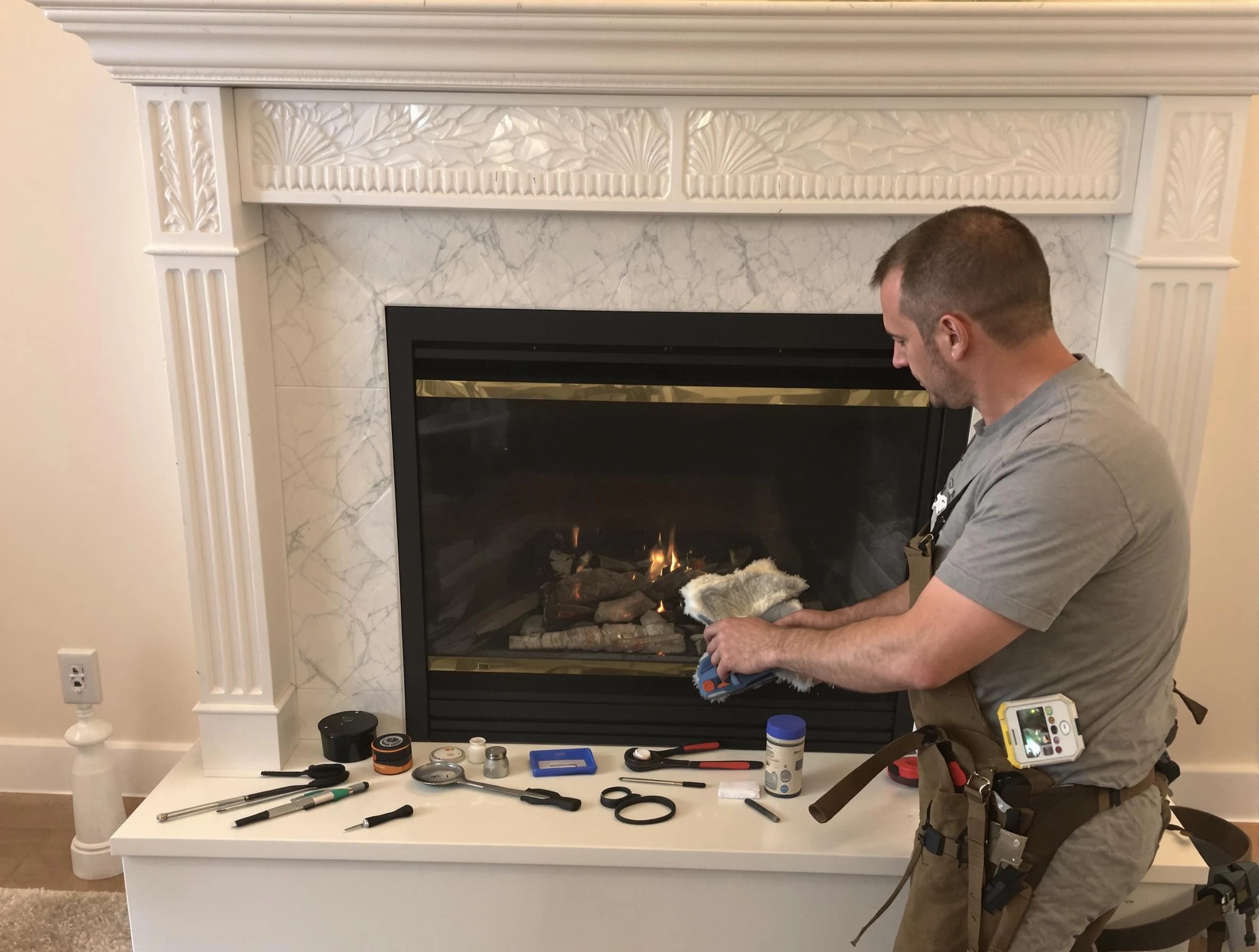 Tarrant Chimney Sweep performing fireplace maintenance in Tarrant, AL